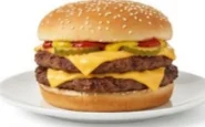 Double-Angus-Cheeseburger-Sesame-Bun Double Angus beef patties with melted American cheese and pickles.