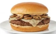 Mushroom-Swiss-Angus-Beef-Burger Angus burger topped with melted Swiss cheese and sautéed mushrooms.